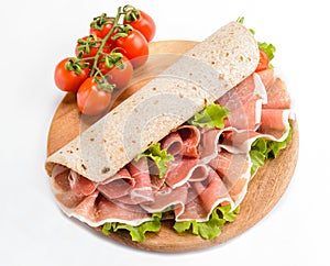 Piadina Romagnola stuffed with raw ham