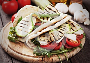 Piadina romagnola with zucchini and mozzarella cheese photo