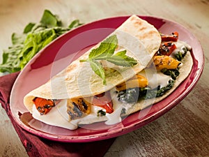 Piadina with spinach photo