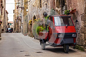 Piaggio Ape at the empty street