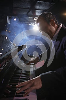 Pianist Performing In Jazz Club