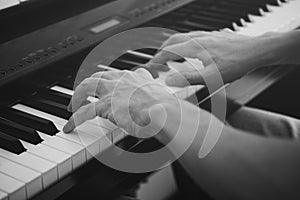 Pianist playing on a digital piano