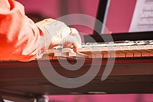 Pianist playing at a jazz festival in a city park