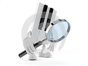 Piano character looking through magnifying glass