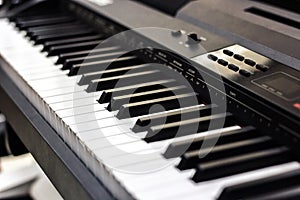 Piano close up black and white Piano keyboard background with selective focus, studio music synthesizer keyboard side view of inst