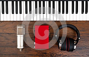 Piano, headphones, microphone and sound card.