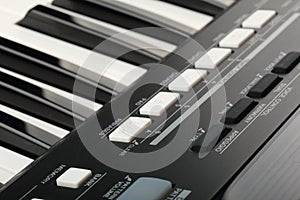 Piano keyboard and controls of synthesizer