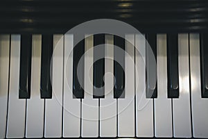 piano keyboard with glossy black & white keys. classic music