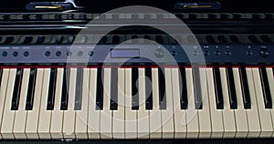 Piano keyboard slow panning over black and white keys