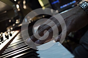 Piano Keyboards In Music Studio And A Hand Of A Musician