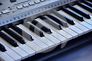 Piano keybord image.Fancy keybord.Flower on a piano keybord.Black and white keybord photo