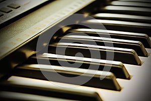 Piano keys from black classic musical piano.