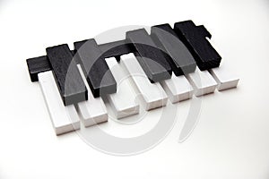 Piano keys on a white background. Learn music. School of Music.