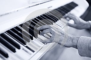 Piano with multy coloure keys. Close up