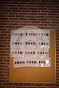 Piano notes hanging on the wall