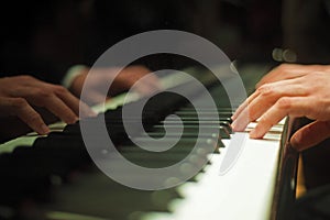 Piano with players hands