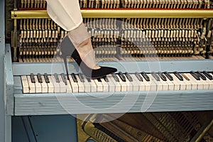 Piano and legs, musical style, grunge instrument.