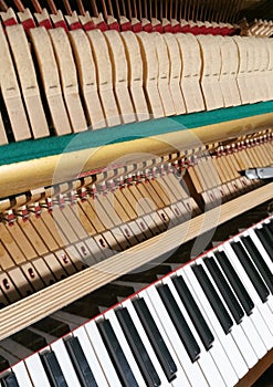 Piano tuning, repairing and cleaning the vintage piano
