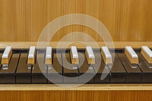 Pianoforte, front view instrument, musical instrument. learn to play the instrument at home. white large piano. piano keyboard. photo