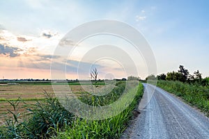 Pianura padana landscape at sunset with a dramatic sky