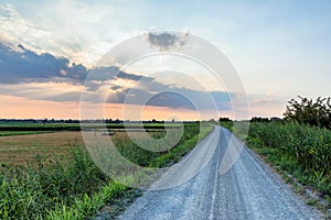 Pianura padana landscape at sunset with a dramatic sky