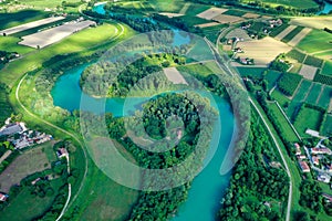 Piave river seen from above with trees and green lagoon