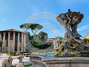 Piazza Bocca della VeritÃ  with the ancient Temple of Hercules Victor and the Fountain of the Tritons, Rome