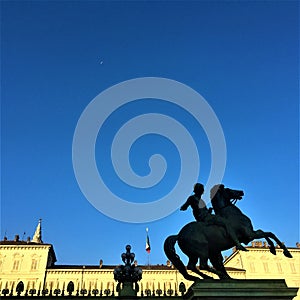 Piazza Castello in Turin city, Italy. Statue, sky and history