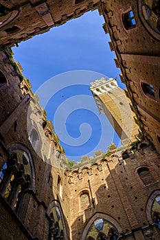 Piazza del Campo is the main square of Siena with view on Palazzo Pubblico