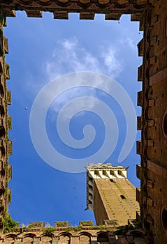Piazza del Campo is the main square of Siena with view on Palazzo Pubblico photo