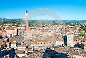 Piazza del Campo at sunset with Palazzo Pubblico, Siena, Italy