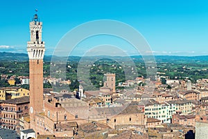 Piazza del Campo at sunset with Palazzo Pubblico, Siena, Italy