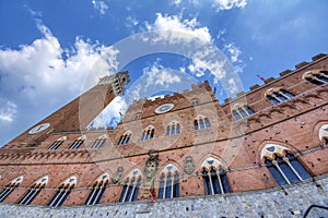Piazza del Campo with The Torre del Mangia tower in Siena