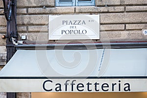 Piazza del Popolo sign on a building wall.
