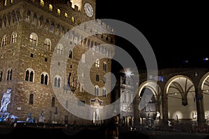 Piazza della Signoria in Florence, Italy at night. Fountain of Neptune and Palazzo Vecchio, aka Ancient Palace