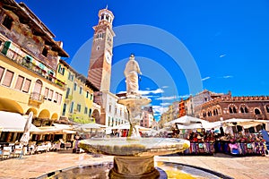 Piazza delle erbe in Verona street and market view