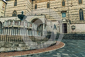 Piazza IV Novembre  in the evening sunrise with monumental fountain Fontana Maggiore, Perugia Italy