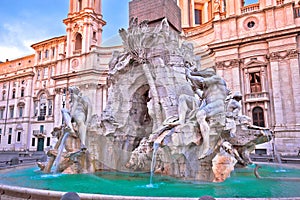 Piazza Navona square Fontana dei Fiumi and church dawn view