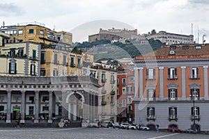 Piazza Plebiscite and Castel Sant`Elmo on hill. Naples landmark. Italian architecture.