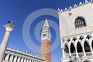 Piazza San Marco with Doge`s Palace; St Mark`s Campanile and Column of San Marco, Venice, Italy.