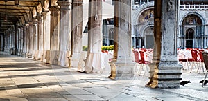 Piazza San Marco loggia with cafe tables