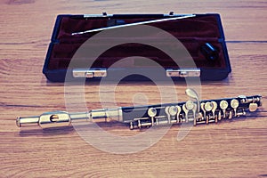 Piccolo flute with red case, close-up