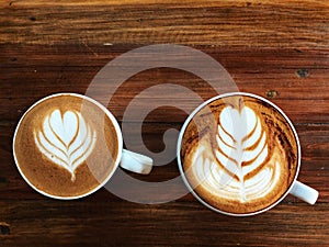 Piccolo latte art coffee and cappuccino coffee in white cup