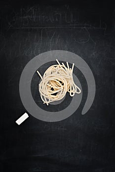 Pici on a Chalkboard with Chalk