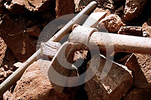 Pick axe and rocks