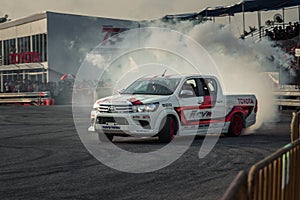 Pick-up car perform drifting with smoke