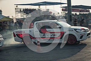 Pick-up car perform drifting on the track with motion blur