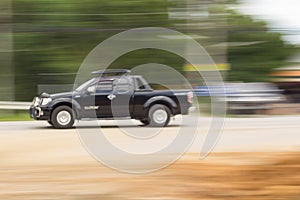 Pick-up Speeding in road, panning camera, Thailand asia