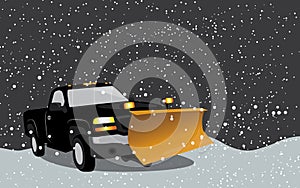 Pick up truck with plow in snow storm