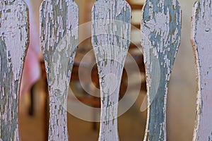 Pickets of old wooden fence. Abstract background with selective focus